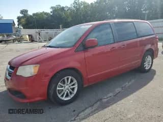 2014 Dodge Grand Caravan SXT with VIN 2C4RDGCG9ER120759, listed as a Copart auction lot 84578145 with 123,978 mi miles and Salvage title. Bid and sale history available at DreamBid. Image 1.