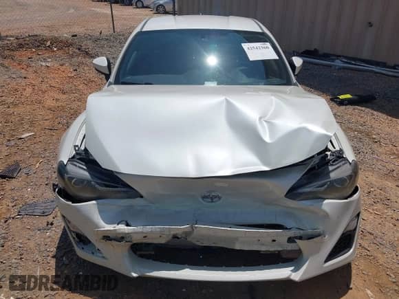 2014 Scion FR-S z VIN JF1ZNAA1XE9709811, wystawiony jako IAAI lot #42542360 z przebiegiem 117 813 mil mil oraz . Historia ofert i sprzedaży dostępna na DreamBid. Obrazek 12.