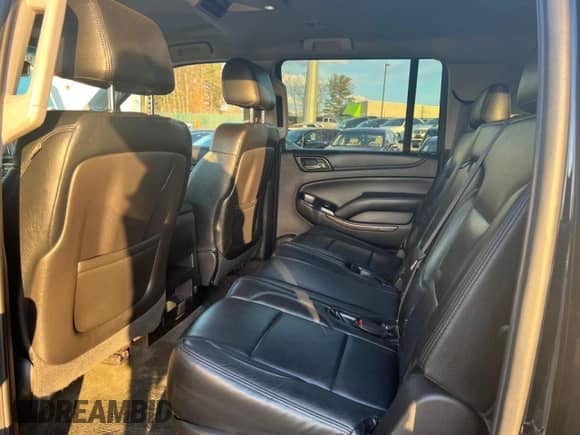 2015 Chevrolet Suburban with VIN 1GNSKHEC4FR25217, listed as a Copart auction lot 65346775 with 213,363 mi miles and Clean title. Bid and sale history available at DreamBid. Image 6.