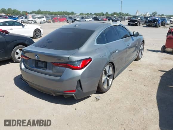 2024 BMW i4 eDrive35 with VIN WBY43AW09RFS60623, listed as a IAAI auction lot 42713384 with 12,857 mi miles and . Bid and sale history available at DreamBid. Image 4.
