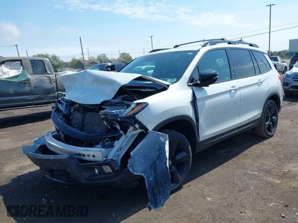 2021 Honda Passport Elite z VIN 5FNYF8H08MB028138, wystawiony jako IAAI lot #42214764 z przebiegiem 22 591 mil mil oraz . Historia ofert i sprzedaży dostępna na DreamBid. Obrazek 18.