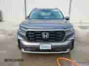 2025 Honda Pilot Elite с VIN 5FNYG1H84SB047079, выставлен на аукционе Copart как лот 83874164 с пробегом 2 563 миль миль и На запчасти • Non repairable. История ставок и продаж доступна на DreamBid. Изображение 5.