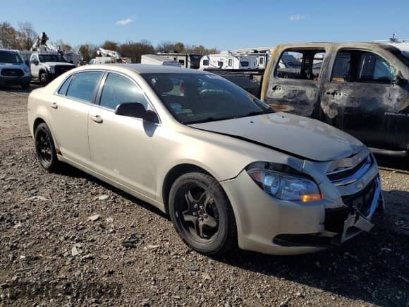 2010 Chevrolet Malibu 1FL with VIN 1G1ZA5E00AF191839, listed as a Copart auction lot 87258415 with 162,812 mi miles and Clean title. Bid and sale history available at DreamBid. Image 4.