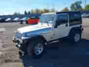 2004 Jeep Wrangler Rubicon with VIN 1J4FA69S34P778038, listed as a IAAI auction lot 43519860 with 145,217 mi miles and . Bid and sale history available at DreamBid. Image 17.