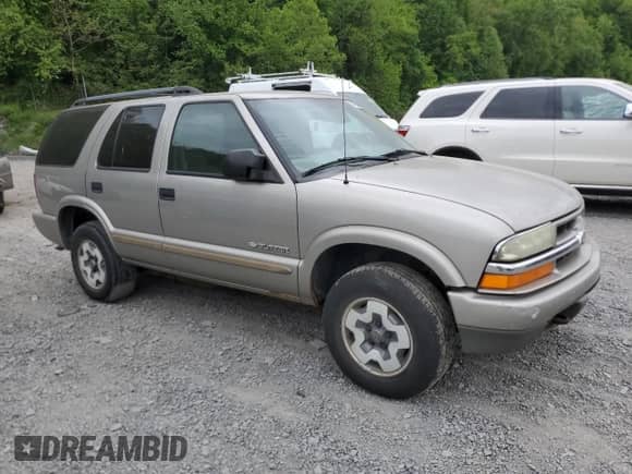 2004 Chevrolet Blazer LS z VIN 1GNDT13X84K162807, wystawiony jako Copart lot #57154205 z przebiegiem 82 732 mil mil oraz Czysty tytuł • Clean title. Historia ofert i sprzedaży dostępna na DreamBid. Obrazek 4.