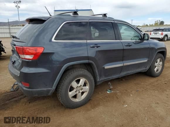 2012 Jeep Grand Cherokee Laredo z VIN 1C4RJFAG5CC202791, wystawiony jako Copart lot #86040175 z przebiegiem 206 265 mil mil oraz Szkoda całkowita • Salvage title. Historia ofert i sprzedaży dostępna na DreamBid. Obrazek 3.