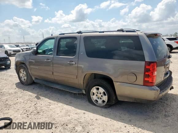 2013 Chevrolet Suburban LT with VIN 1GNSCJE01DR330091, listed as a Copart auction lot 70826395 with 187,683 mi miles and Salvage title. Bid and sale history available at DreamBid. Image 2.