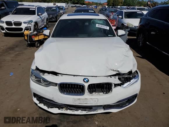 2018 BMW 3 Series 330i xDrive z VIN WBA8D9C50JA615675, wystawiony jako Copart lot #80582015 z przebiegiem 99 167 mil mil oraz Szkoda całkowita • Salvage title. Historia ofert i sprzedaży dostępna na DreamBid. Obrazek 5.