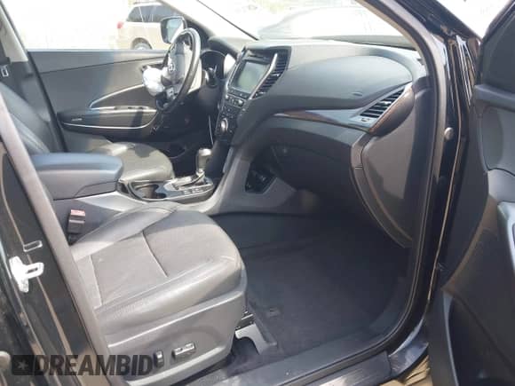 2017 Hyundai Santa Fe Ultimate with VIN 5NMZW4LA6HH047532, listed as a IAAI auction lot 42871398 with 26,910 mi miles and . Bid and sale history available at DreamBid. Image 5.