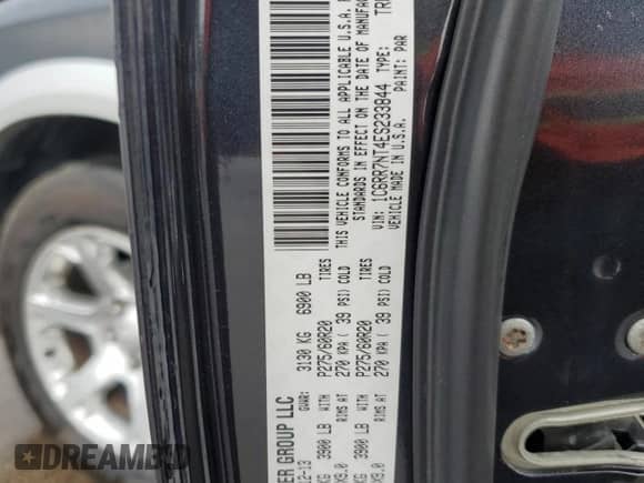 2014 Ram 1500 Laramie with VIN 1C6RR7NT4ES233844, listed as a Copart auction lot 66480495 with 204,605 mi miles and Salvage title. Bid and sale history available at DreamBid. Image 12.