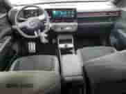 2025 Hyundai Kona N Line S with VIN KM8HBCA33SU207898, listed as a Copart auction lot 50381255 with 413 mi miles and Salvage title. Bid and sale history available at DreamBid. Image 8.