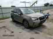 2017 Subaru Forester Touring z VIN JF2SJGWC1HH557983, wystawiony jako Copart lot #68510025 z przebiegiem 122 654 mil mil oraz Szkoda całkowita • Salvage title. Historia ofert i sprzedaży dostępna na DreamBid. Obrazek 14.
