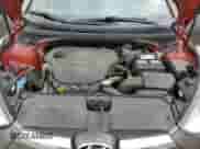 2014 Hyundai Veloster z VIN KMHTC6AD0EU196106, wystawiony jako Copart lot #69494305 z przebiegiem 102 472 mil mil oraz Szkoda całkowita • Salvage title. Historia ofert i sprzedaży dostępna na DreamBid. Obrazek 11.