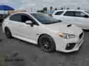 2016 Subaru WRX Premium with VIN JF1VA1E61G9816507, listed as a Copart auction lot 83974475 with 89,548 mi miles and Salvage title. Bid and sale history available at DreamBid. Image 4.