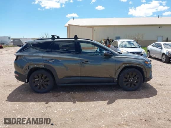 2023 Hyundai Tucson XRT with VIN KM8JFCAE6PU176449, listed as a IAAI auction lot 42159993 with 64,178 mi miles and . Bid and sale history available at DreamBid. Image 14.