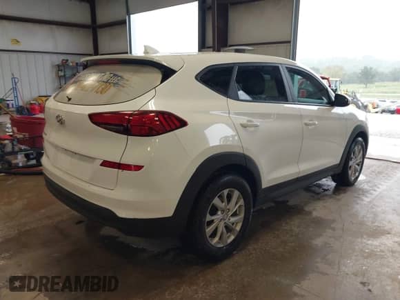 2021 Hyundai Tucson SE with VIN KM8J23A46MU365472, listed as a IAAI auction lot 43077317 with 94,891 mi miles and . Bid and sale history available at DreamBid. Image 4.