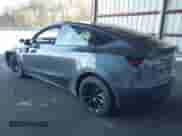 2022 Tesla Model Y Long Range z VIN 7SAYGDEE9NA010903, wystawiony jako IAAI lot #43397965 z przebiegiem 20 830 mil mil oraz . Historia ofert i sprzedaży dostępna na DreamBid. Obrazek 3.