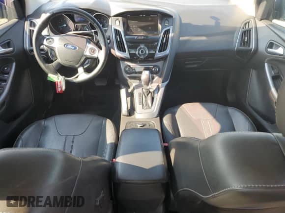 2013 Ford Focus Titanium with VIN 1FADP3J22DL113473, listed as a Copart auction lot 69153185 with 109,640 mi miles and Salvage title. Bid and sale history available at DreamBid. Image 8.