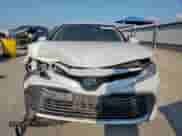 2019 Toyota Camry Hybrid LE с VIN 4T1B21HK2KU512025, выставлен на аукционе Copart как лот 80734415 с пробегом 106 463 миль миль и Списание • Salvage title. История ставок и продаж доступна на DreamBid. Изображение 5.