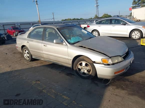 1997 Honda Accord Special Edition with VIN 1HGCD5604VA125673, listed as a IAAI auction lot 43289440 with 243,649 mi miles and . Bid and sale history available at DreamBid. Image 1.