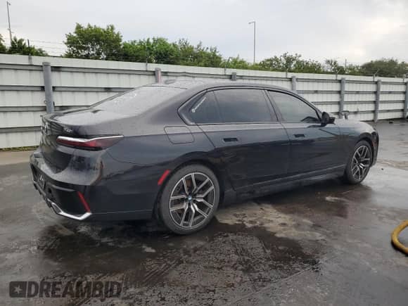 2023 BMW 7 Series 740i с VIN WBA23EH01PCM48626, выставлен на аукционе Copart как лот 80135785 с пробегом 35 471 миль миль и На запчасти • Non repairable. История ставок и продаж доступна на DreamBid. Изображение 3.