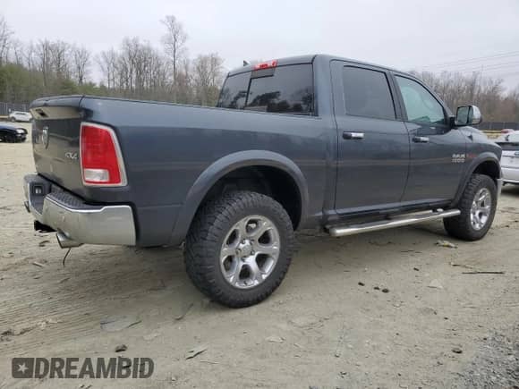 2017 Ram 1500 Laramie with VIN 1C6RR7NM1HS877377, listed as a Copart auction lot 49247785 with 169,389 mi miles and Salvage title. Bid and sale history available at DreamBid. Image 3.