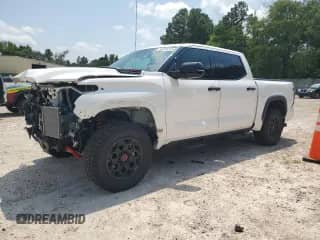 2023 Toyota Tundra TRD Pro Hybrid with VIN 5TFPC5DB8PX026040, listed as a Copart auction lot 63108315 with 30,920 mi miles and Salvage title. Bid and sale history available at DreamBid. Image 1.