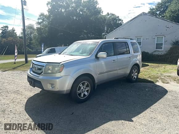 2010 Honda Pilot Touring с VIN 5FNYF4H88AB019661, выставлен на аукционе Copart как лот 85937495 с пробегом 188 907 миль миль и Чистый • Clean title. История ставок и продаж доступна на DreamBid. Изображение 2.