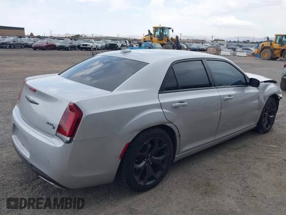 2021 Chrysler 300 S with VIN 2C3CCABG6MH520049, listed as a IAAI auction lot 42419672 with 56,303 mi miles and . Bid and sale history available at DreamBid. Image 4.