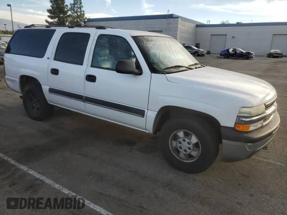 2000 Chevrolet Suburban LT z VIN 3GNEC16T5YG189571, wystawiony jako Copart lot #77704644 z przebiegiem 280 021 mil mil oraz Czysty tytuł • Clean title. Historia ofert i sprzedaży dostępna na DreamBid. Obrazek 4.