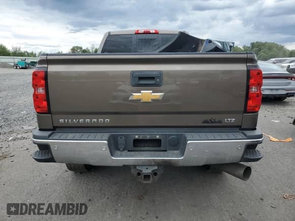 2015 Chevrolet Silverado 3500HD LTZ with VIN 1GC4K0E88FF572157, listed as a Copart auction lot 67583004 with 156,783 mi miles and Salvage title. Bid and sale history available at DreamBid. Image 6.