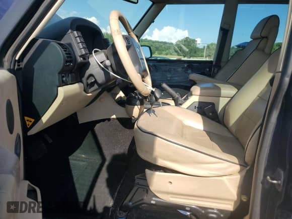 2003 Land Rover Discovery с VIN SALTY14403A774474, выставлен на аукционе Copart как лот 68020865 с пробегом 155 550 миль миль и Чистый • Clean title. История ставок и продаж доступна на DreamBid. Изображение 7.