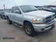 2006 Dodge 1500 SLT with VIN 1D7HA18N06J115907, listed as a IAAI auction lot 43059151 with 265,861 mi miles and . Bid and sale history available at DreamBid. Image 1.