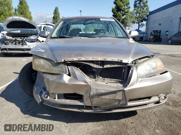 2006 Hyundai Elantra GLS z VIN KMHDN46D16U242376, wystawiony jako Copart lot #81921225 z przebiegiem 103 589 mil mil oraz Szkoda całkowita • Salvage title. Historia ofert i sprzedaży dostępna na DreamBid. Obrazek 5.