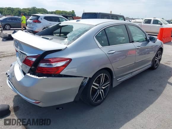 2016 Honda Accord Touring with VIN 1HGCR3F97GA031715, listed as a IAAI auction lot 43144733 with Not provided miles and . Bid and sale history available at DreamBid. Image 4.