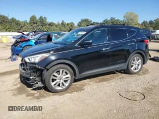 2013 Hyundai Santa Fe Sport z VIN 5XYZU3LA1DG030898, wystawiony jako Copart lot #85707835 z przebiegiem 69 782 mil mil oraz Szkoda całkowita • Salvage title. Historia ofert i sprzedaży dostępna na DreamBid. Obrazek 1.