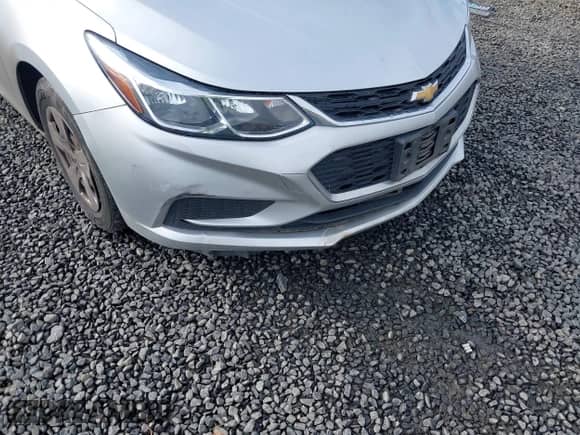 2018 Chevrolet Cruze LS with VIN 1G1BB5SMXJ7188902, listed as a IAAI auction lot 41896739 with 104,084 mi miles and . Bid and sale history available at DreamBid. Image 6.