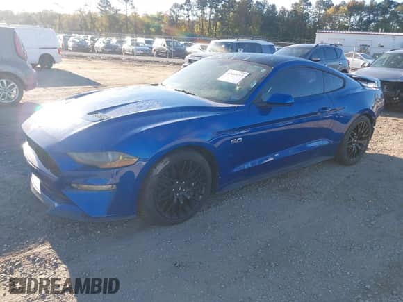 2018 Ford Mustang GT z VIN 1FA6P8CFXJ5165276, wystawiony jako IAAI lot #43469214 z przebiegiem 76 076 mil mil oraz . Historia ofert i sprzedaży dostępna na DreamBid. Obrazek 17.