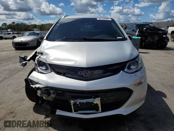 2017 Chevrolet Bolt EV Premier z VIN 1G1FX6S01H4161198, wystawiony jako Copart lot #69126883 z przebiegiem 88 117 mil mil oraz . Historia ofert i sprzedaży dostępna na DreamBid. Obrazek 5.