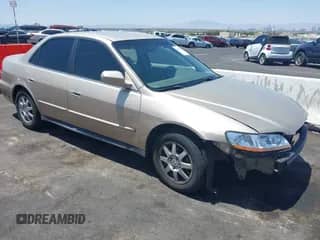 2002 Honda Accord LX with VIN 3HGCG665X2G703605, listed as a IAAI auction lot 42593306 with 165,176 mi miles and . Bid and sale history available at DreamBid. Image 1.