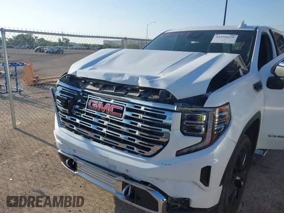 2023 GMC Sierra 1500 Denali z VIN 3GTUUGED4PG345211, wystawiony jako IAAI lot #42995625 z przebiegiem 63 396 mil mil oraz . Historia ofert i sprzedaży dostępna na DreamBid. Obrazek 6.