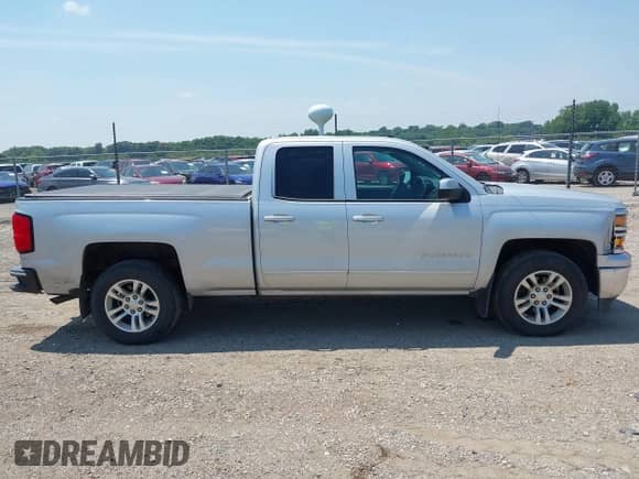 2015 Chevrolet Silverado 1500 LT with VIN 1GCRCREC9FZ163790, listed as a IAAI auction lot 42650883 with 173,313 mi miles and . Bid and sale history available at DreamBid. Image 13.