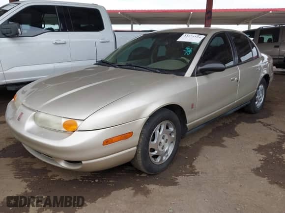 2001 Saturn SL with VIN 1G8ZJ54771Z315992, listed as a IAAI auction lot 41571554 with 262,240 mi miles and . Bid and sale history available at DreamBid. Image 17.
