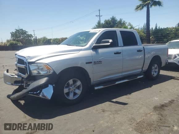 2018 Ram 1500 Tradesman z VIN 1C6RR6KM8JS290873, wystawiony jako Copart lot #63148965 z przebiegiem 97 900 mil mil oraz Szkoda całkowita • Salvage title. Historia ofert i sprzedaży dostępna na DreamBid. Obrazek 1.