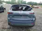 2023 Mazda CX-5 S Preferred z VIN JM3KFBCM5P0199095, wystawiony jako Copart lot #67264225 z przebiegiem 7 969 mil mil oraz Szkoda całkowita • Salvage title. Historia ofert i sprzedaży dostępna na DreamBid. Obrazek 6.