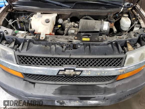 2004 Chevrolet City Express Cargo z VIN 1GNFH15T541139978, wystawiony jako Copart lot #77352684 z przebiegiem 319 192 mil mil oraz Szkoda całkowita • Salvage title. Historia ofert i sprzedaży dostępna na DreamBid. Obrazek 11.