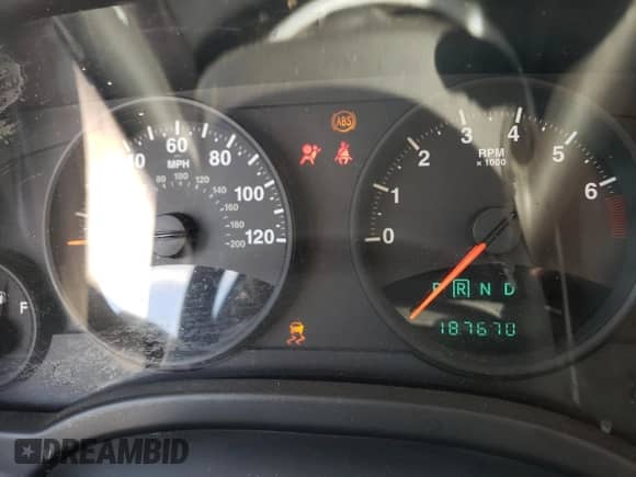 2010 Jeep Compass Sport z VIN 1J4NT1FB0AD659003, wystawiony jako Copart lot #63768104 z przebiegiem 187 670 mil mil oraz Szkoda całkowita • Salvage title. Historia ofert i sprzedaży dostępna na DreamBid. Obrazek 9.