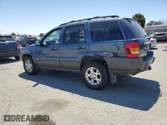 2001 Jeep Grand Cherokee Laredo с VIN 1J4GW48S01C704008, выставлен на аукционе Copart как лот 66754445 с пробегом 173 445 миль миль и Списание • Salvage title. История ставок и продаж доступна на DreamBid. Изображение 2.