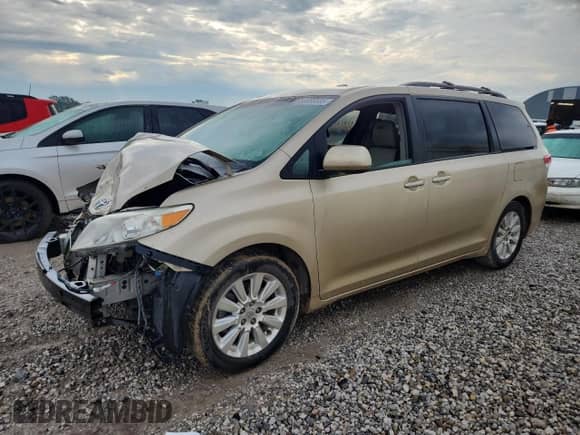 2011 Toyota Sienna XLE with VIN 5TDYK3DC6BS029912, listed as a Copart auction lot 80886585 with 220,028 mi miles and Salvage title. Bid and sale history available at DreamBid. Image 1.