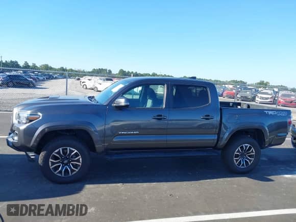 2020 Toyota Tacoma SR5 with VIN 3TMCZ5AN8LM296929, listed as a IAAI auction lot 43118349 with 68,020 mi miles and . Bid and sale history available at DreamBid. Image 15.